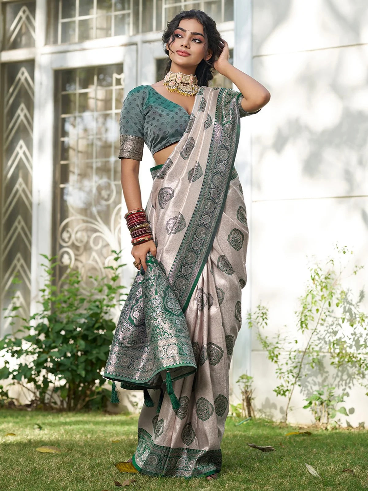 Tarani Gaurika green silk blend saree front view with rich border and festive styling
