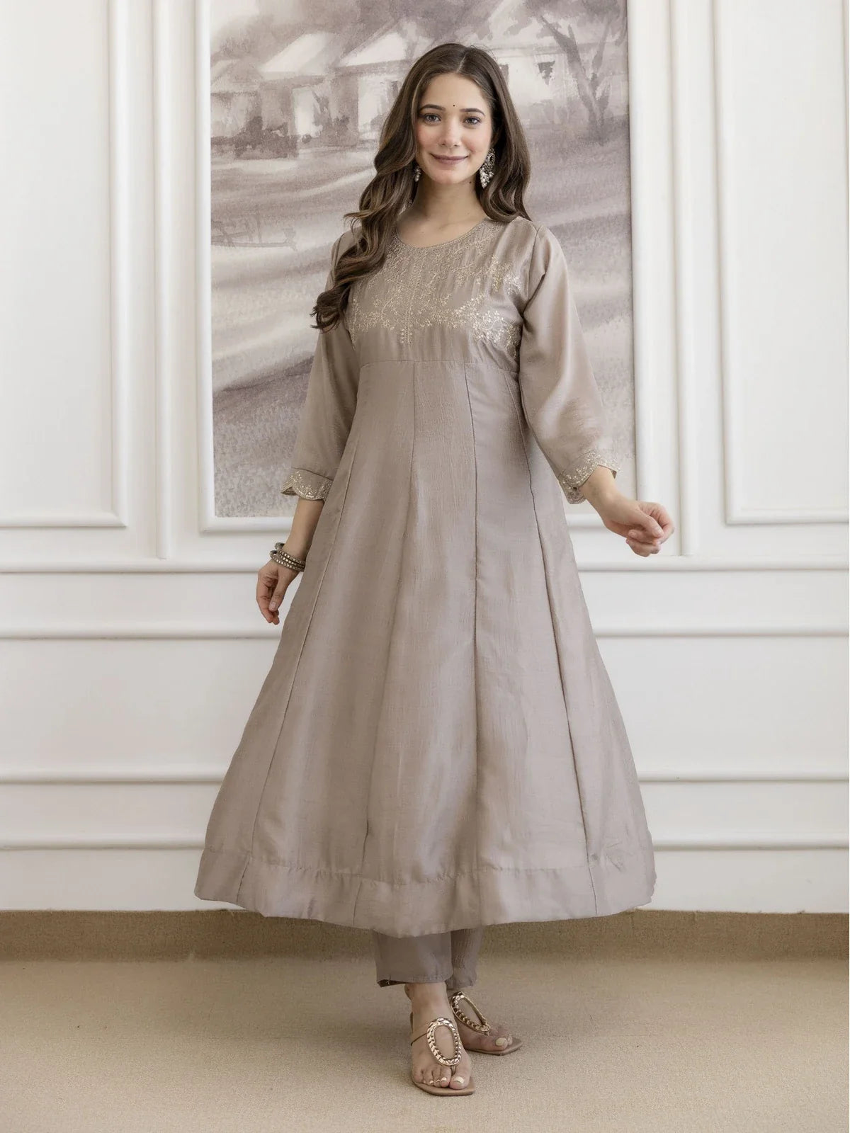 Tarani beige silk ethnic dress front pose highlighting elegant design and flare