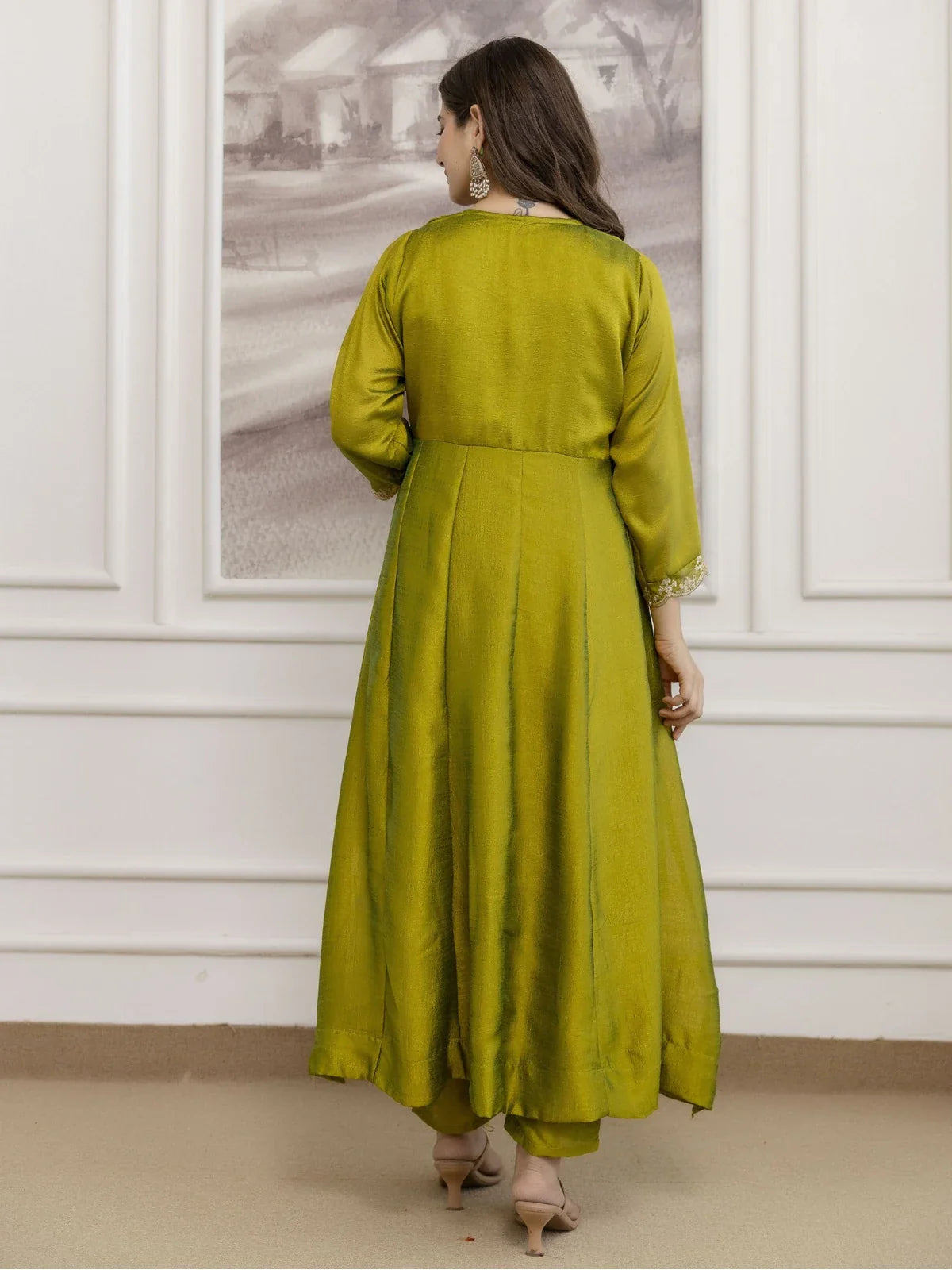 Tarani silk festive wear green dress back view with soft pleated finish