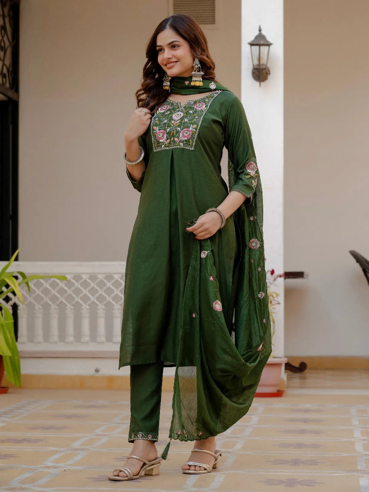 Side view of Tarani green festive silk dress with dupatta and pants