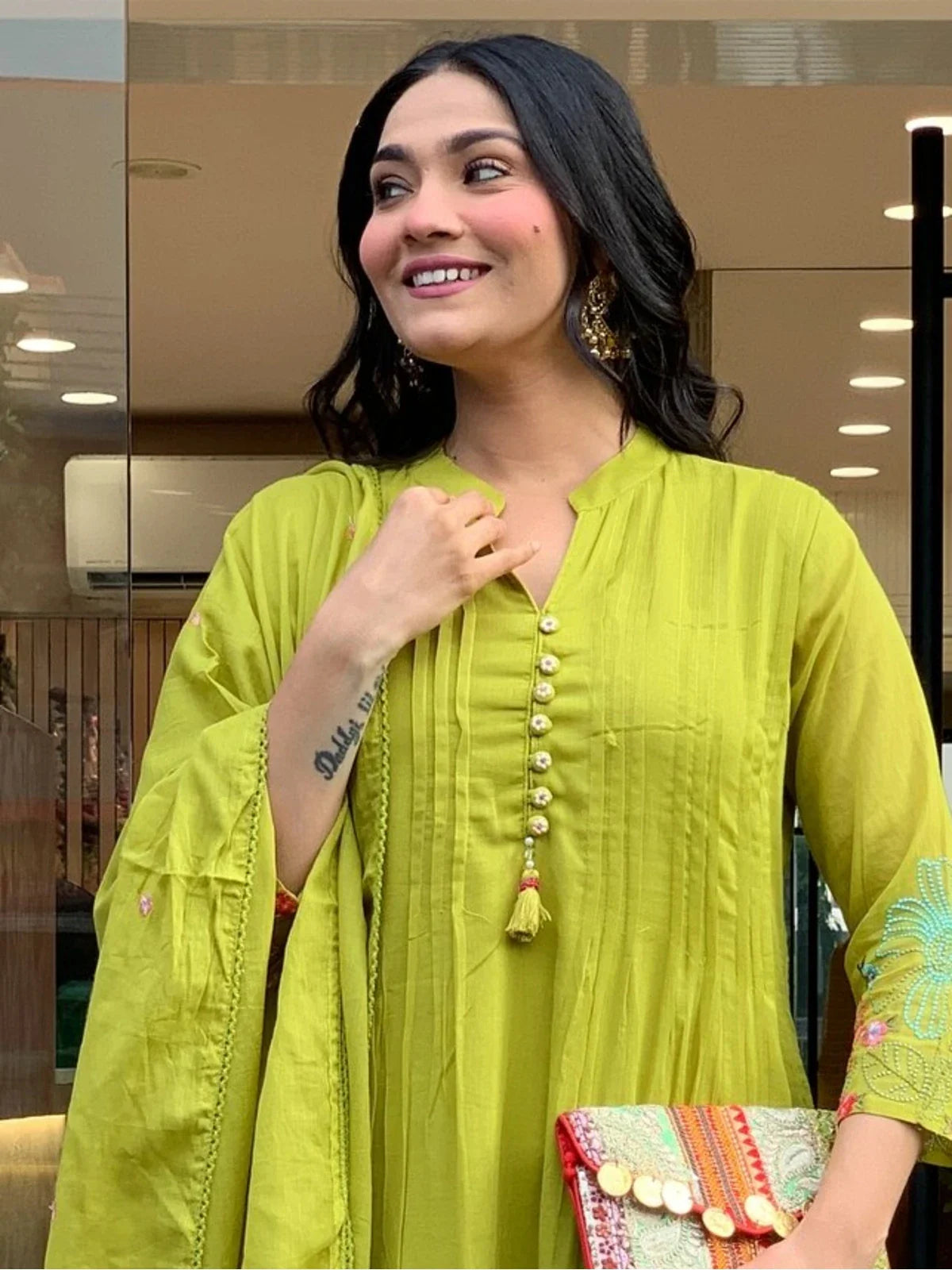 Tarani green chanderi silk dress showing detailed neckline and upper embroidery