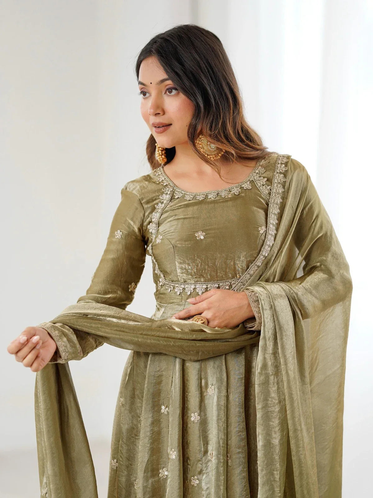 Tarani premium embroidered silk green dress with elegant dupatta upper body close-up