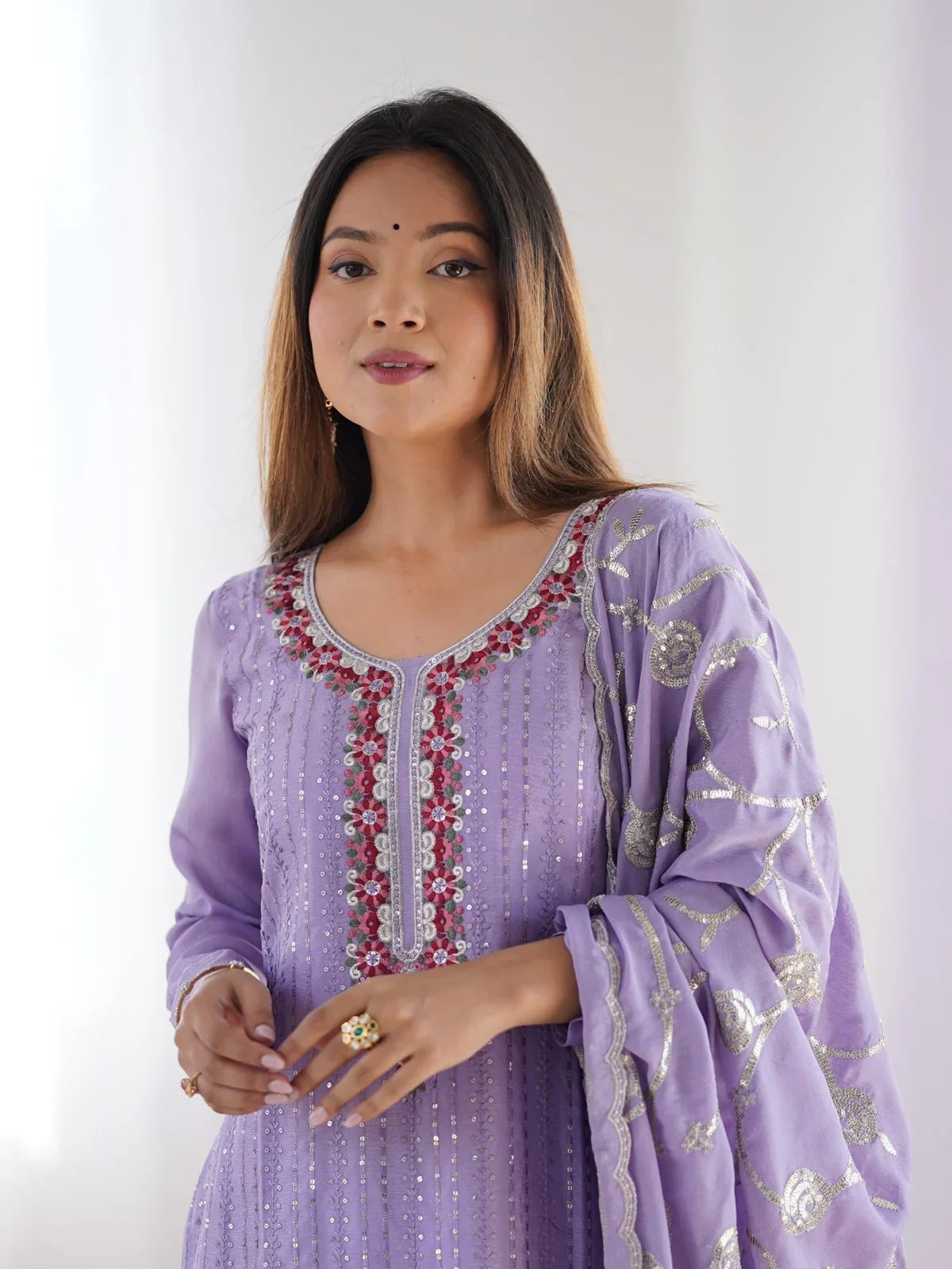 Tarani lavender dress closeup with floral sequin neckline and soft micro inner