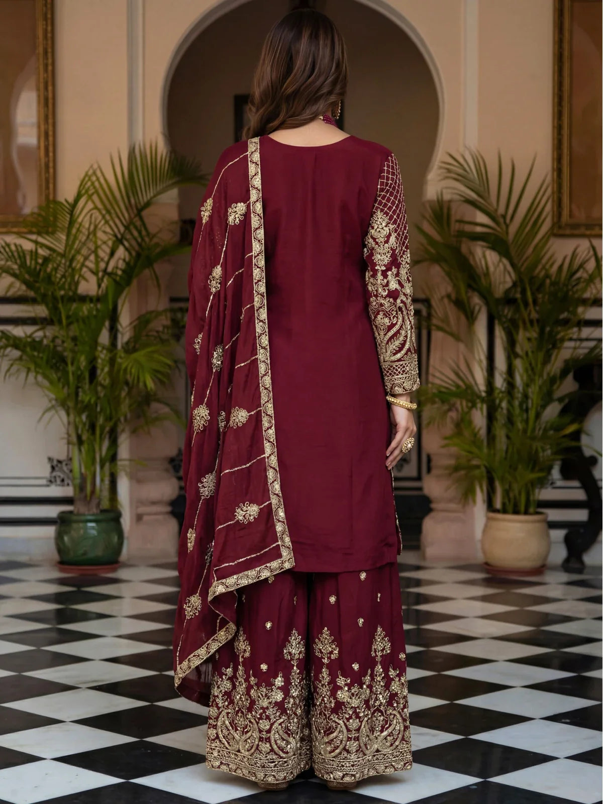 Tarani back view maroon silk dress with zari work and designer dupatta