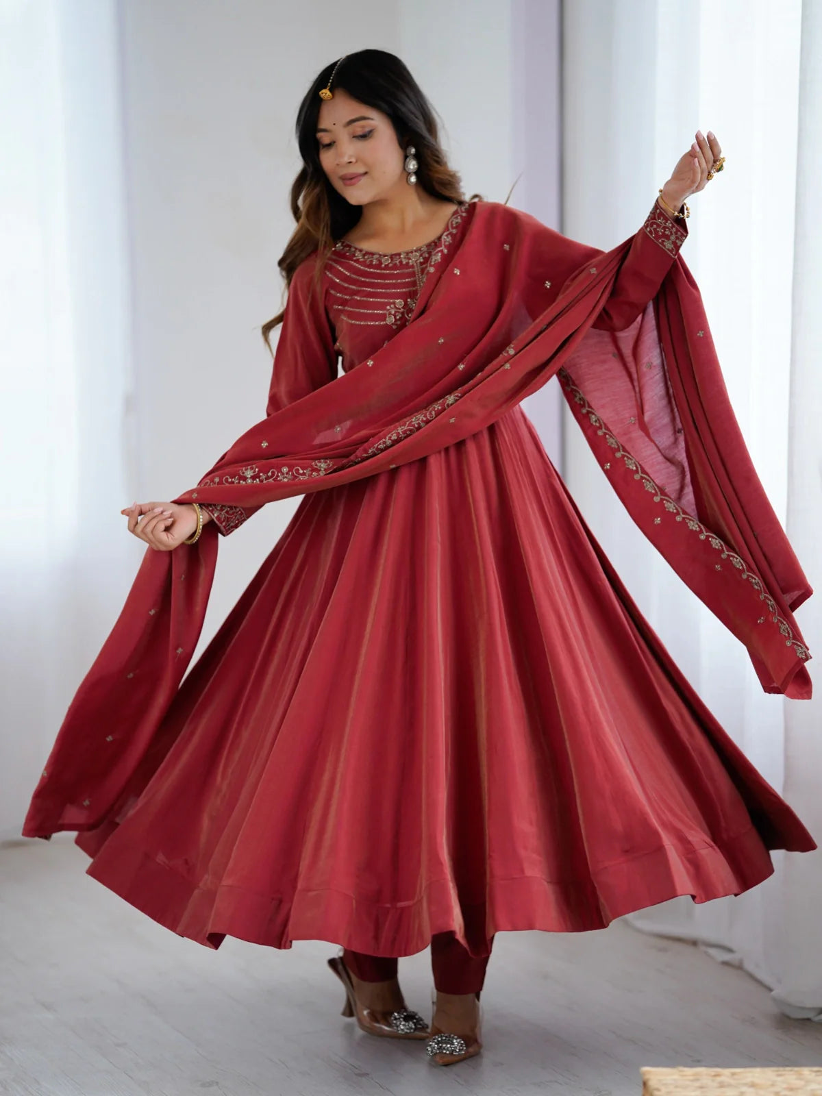 Tarani maroon silk Anarkali dress front view with graceful flair and dupatta embroidery