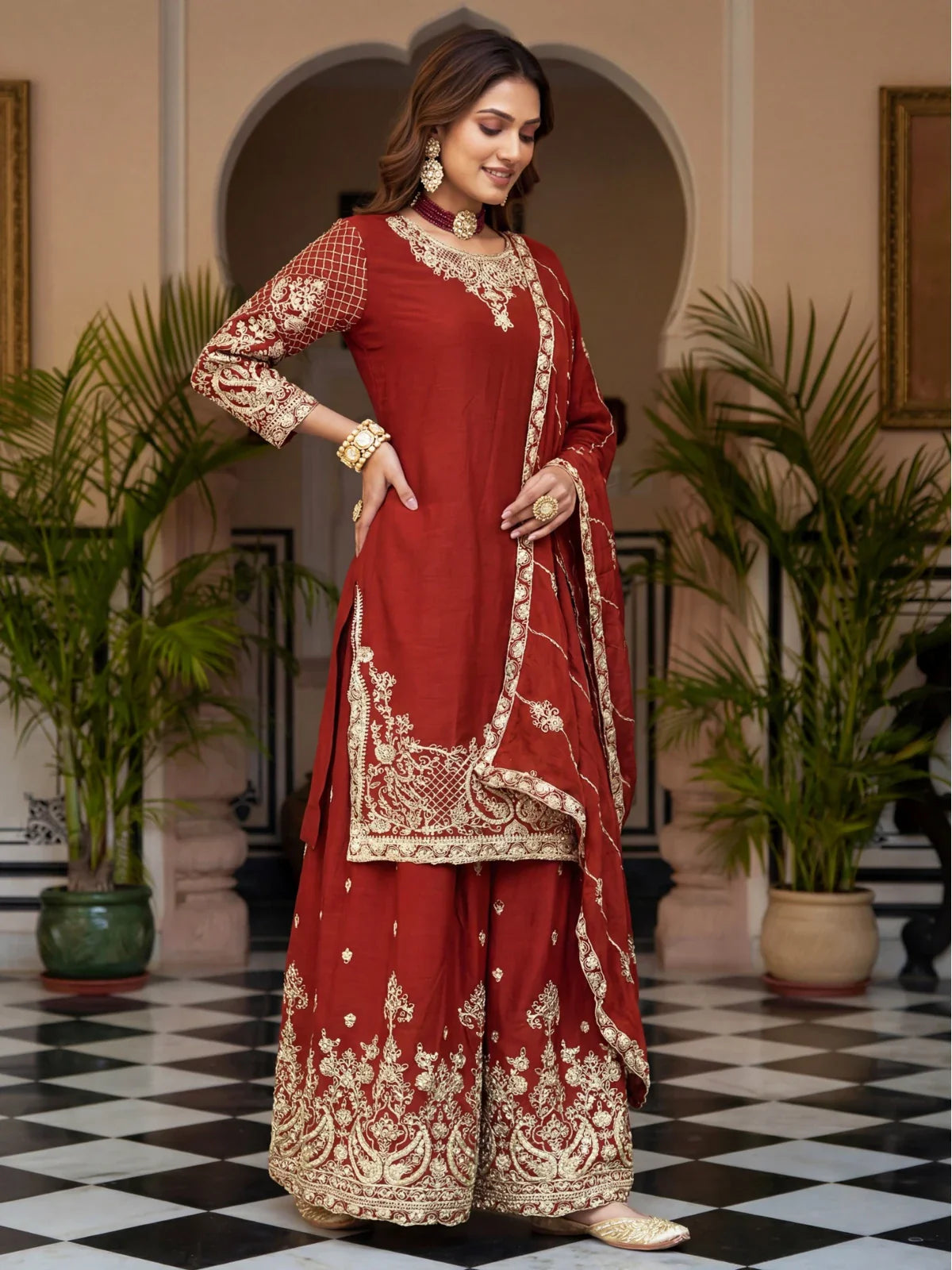 Tarani maroon Chinon silk dress with palazzo and dupatta side pose view