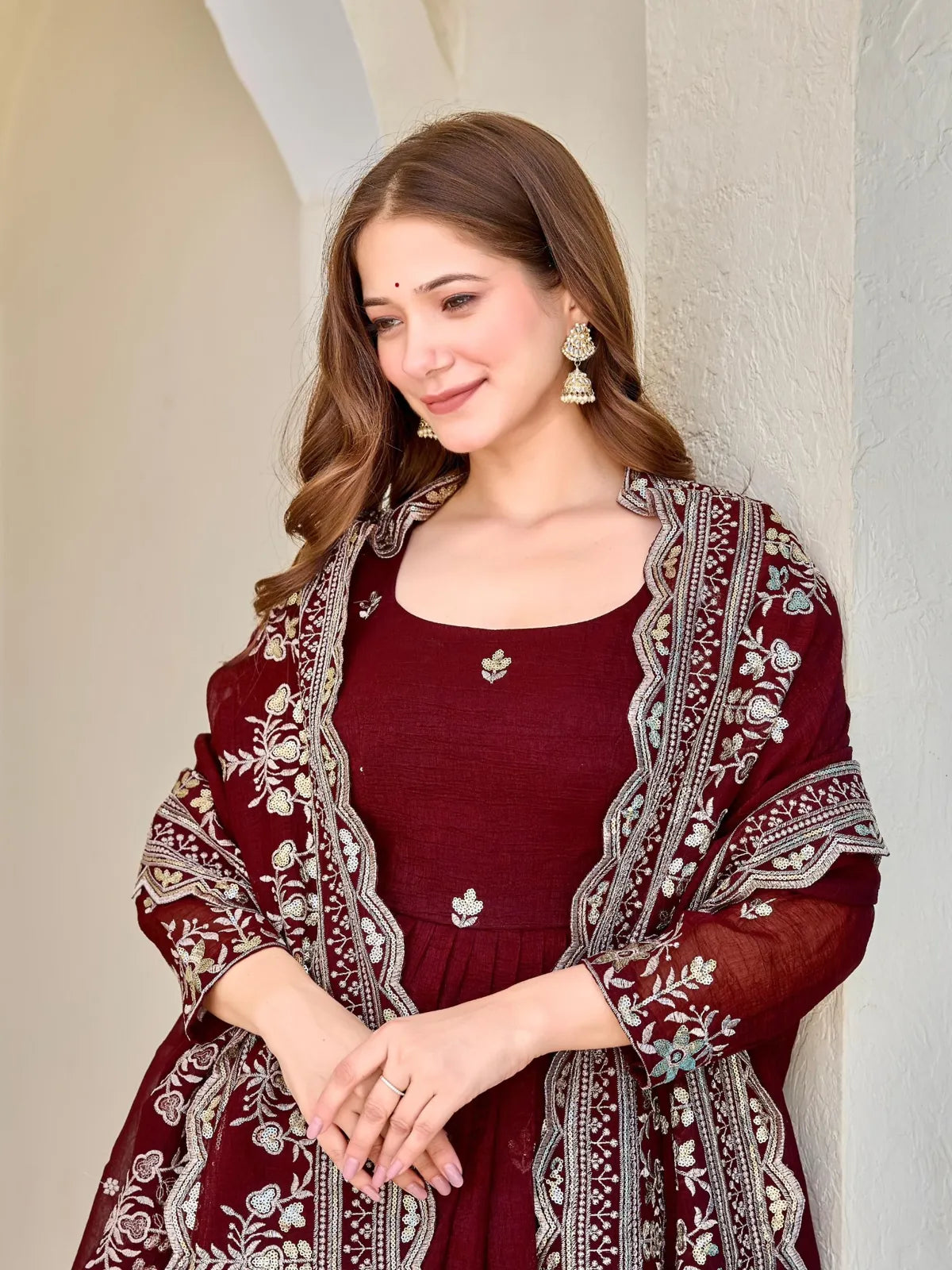 Tarani maroon dress closeup showing neckline embroidery and dupatta border