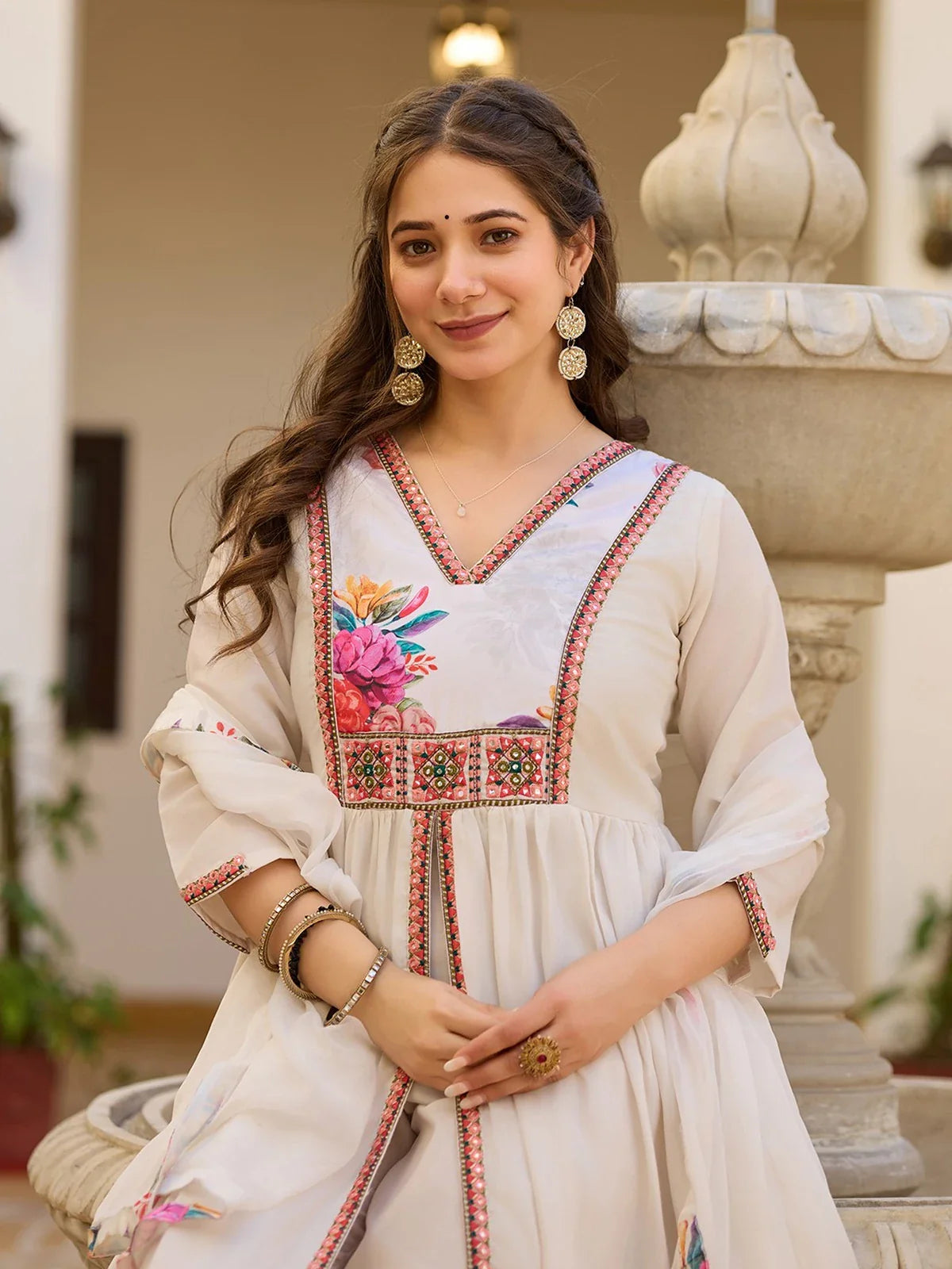 Tarani off white silk embroidered dress showing upper body detailing and neckline