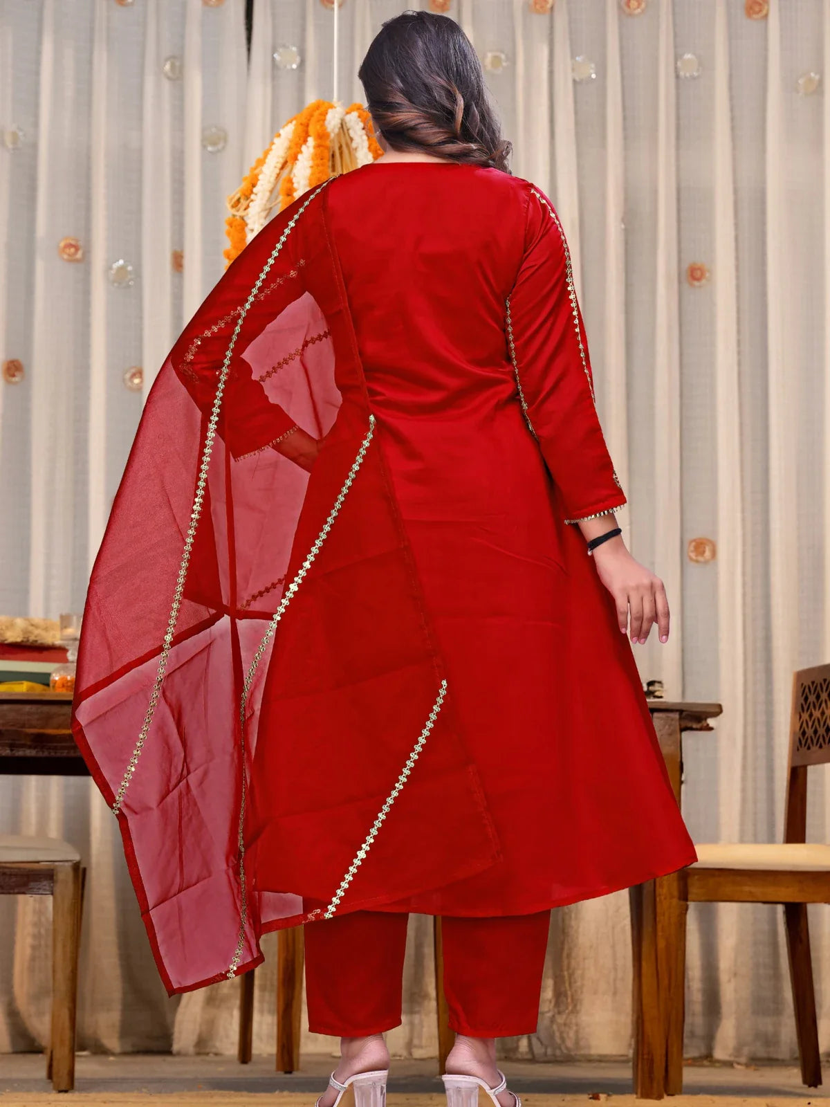 Tarani red dress back view with plain silhouette and soft organza dupatta fall