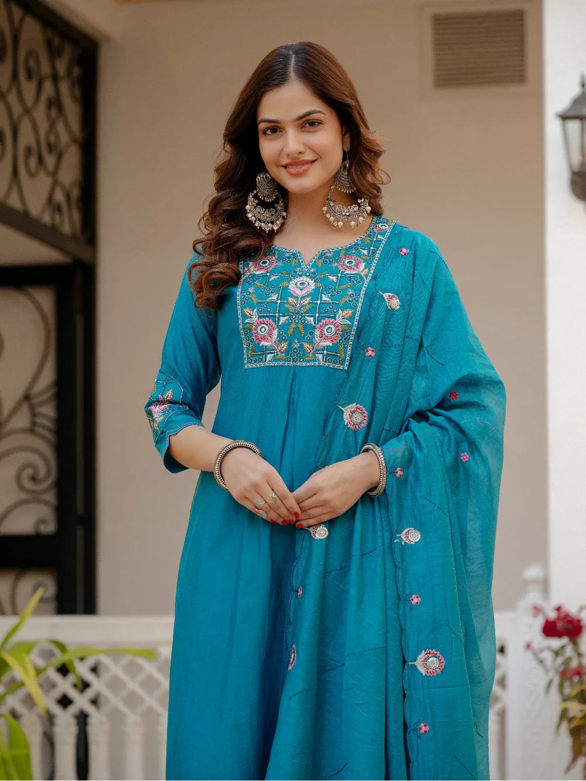 Tarani premium teal mango silk kurti close-up with multi-thread embroidery and sequin handwork