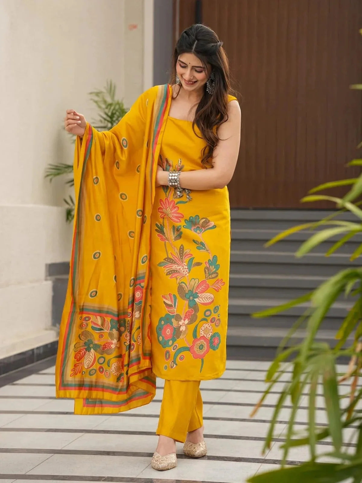 Tarani yellow silk kurti with pant and dupatta front view festive look