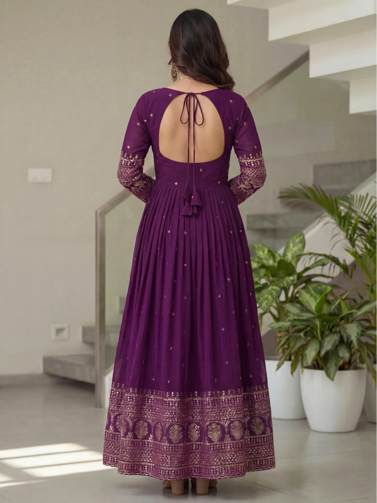 Tarani back view of purple silk gown with tie-up dori and open back design for weddings and celebrations