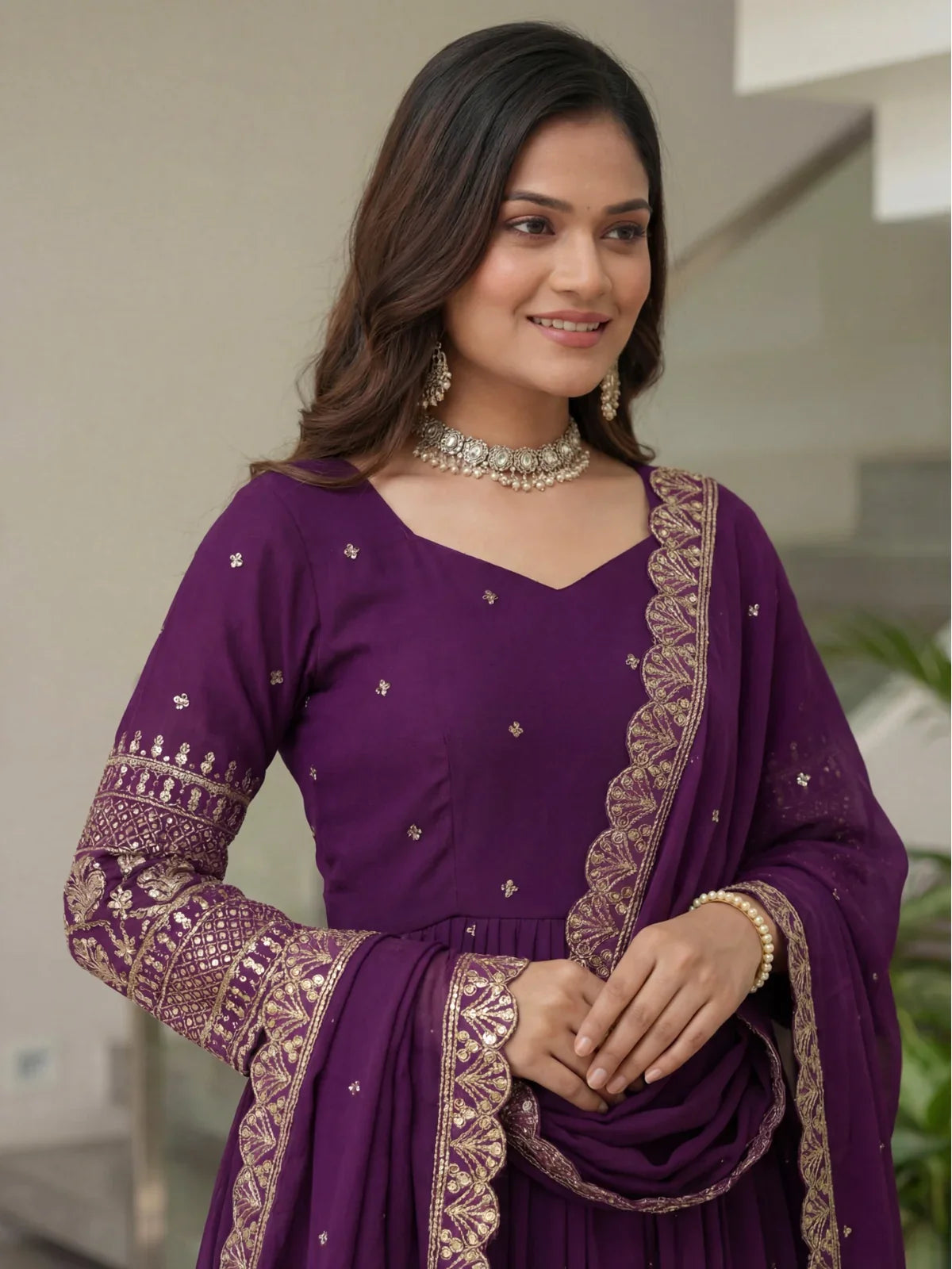 Tarani purple silk gown showing neckline, sleeve embroidery and scallop dupatta border in close view
