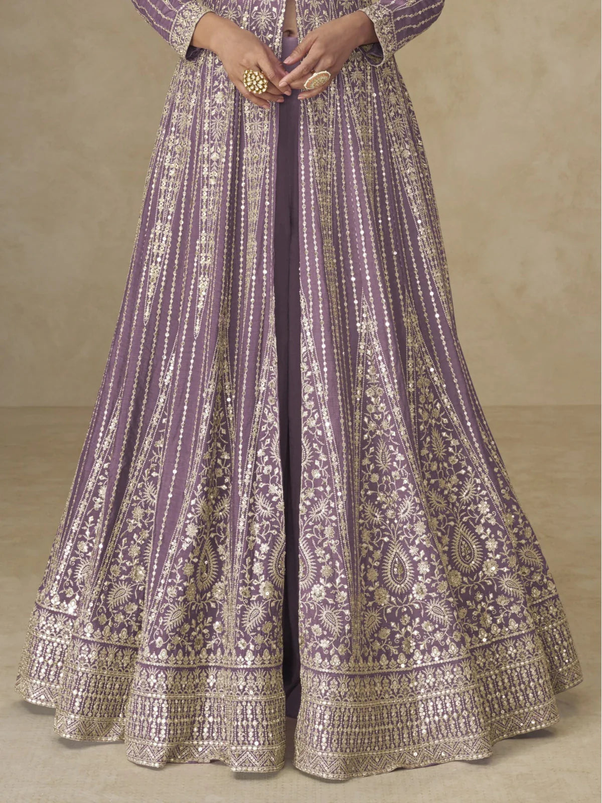 Tarani lavender Chinnon silk gown border and intricate golden detailing closeup