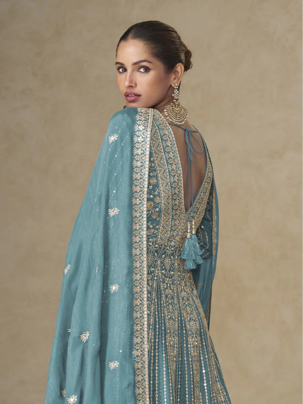 Tarani teal silk gown back view showing elegant tie-up and dupatta drape
