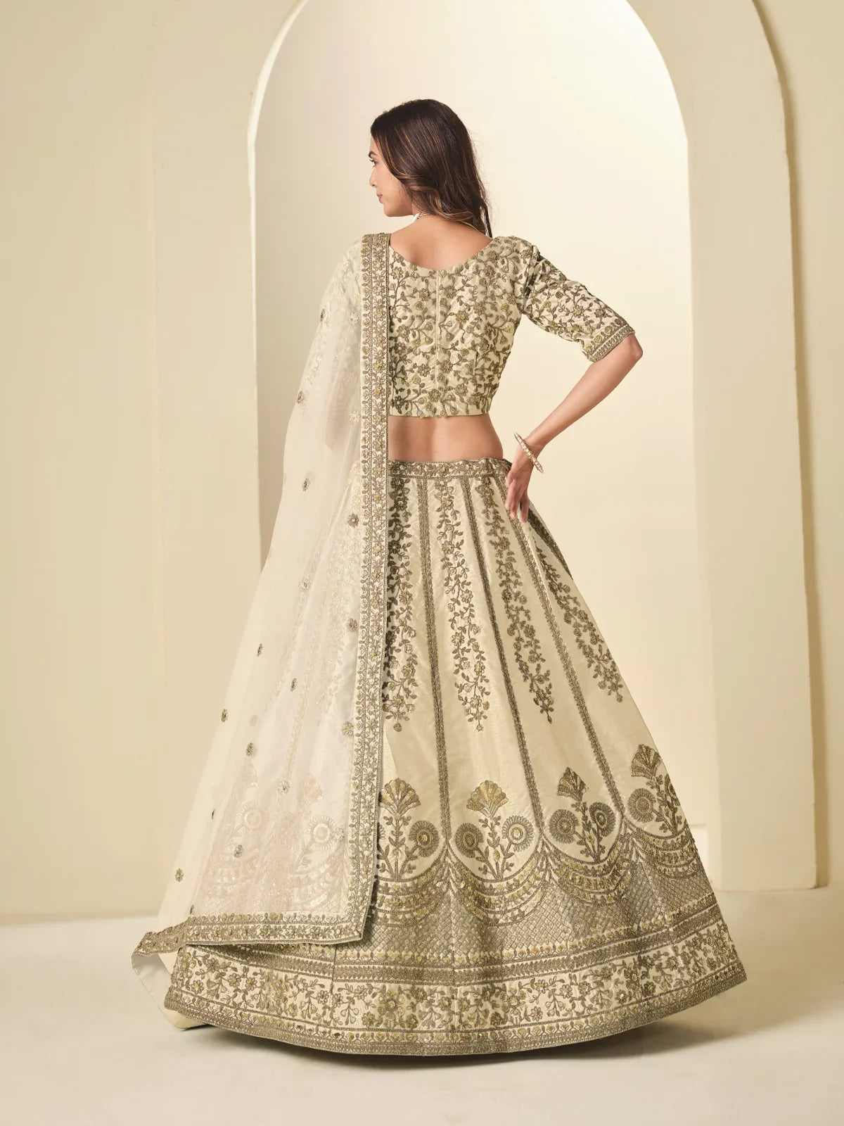 Tarani beige silk lehenga back view showing blouse embroidery and dupatta drape