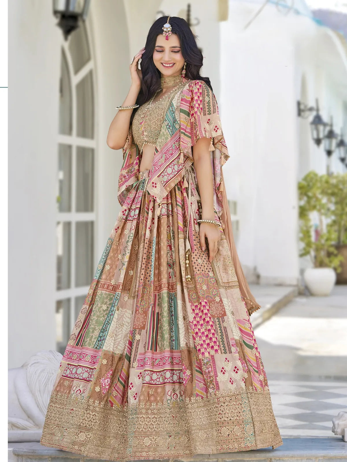 Tarani beige embroidered chinnon silk lehenga with zari detailing for festive functions