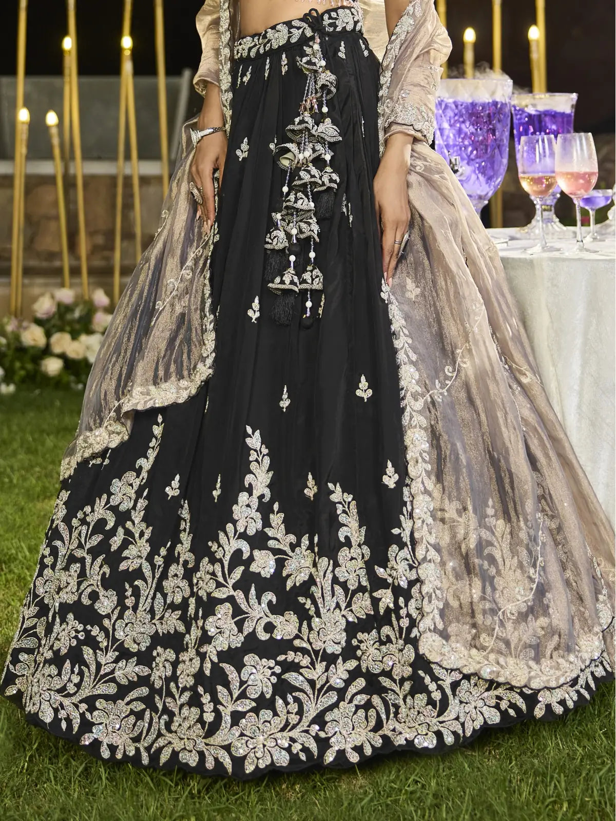 Tarani black satin silk lehenga front view close up with sequin embroidery and dupatta border