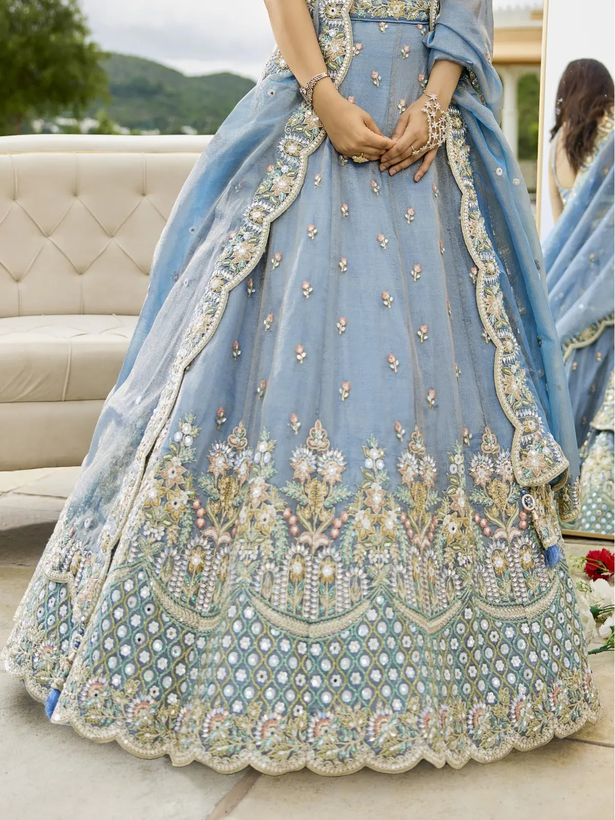Tarani blue silk lehenga closeup view highlighting embroidery and hemline details