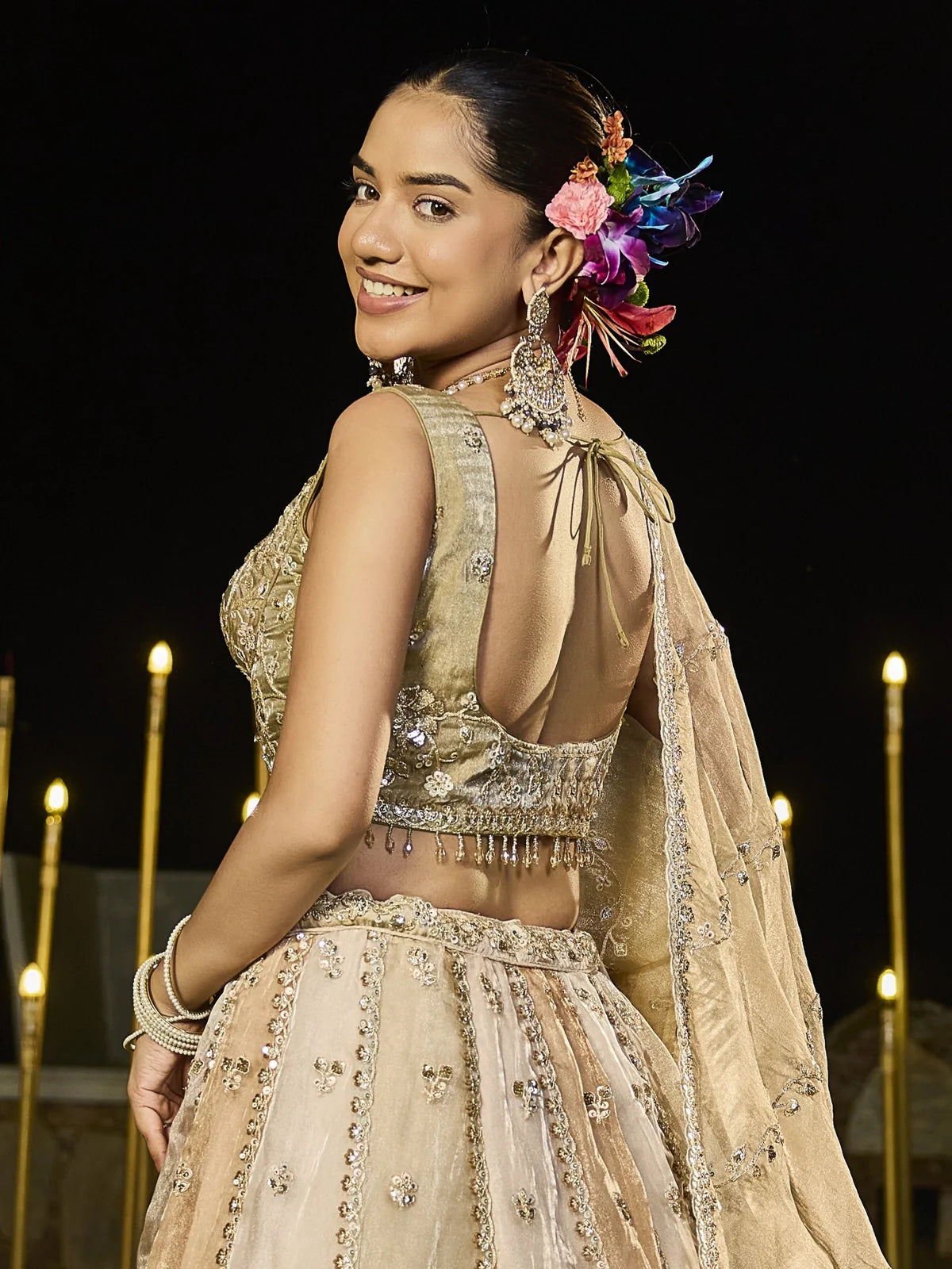 Tarani golden silk lehenga back blouse design view with dupatta