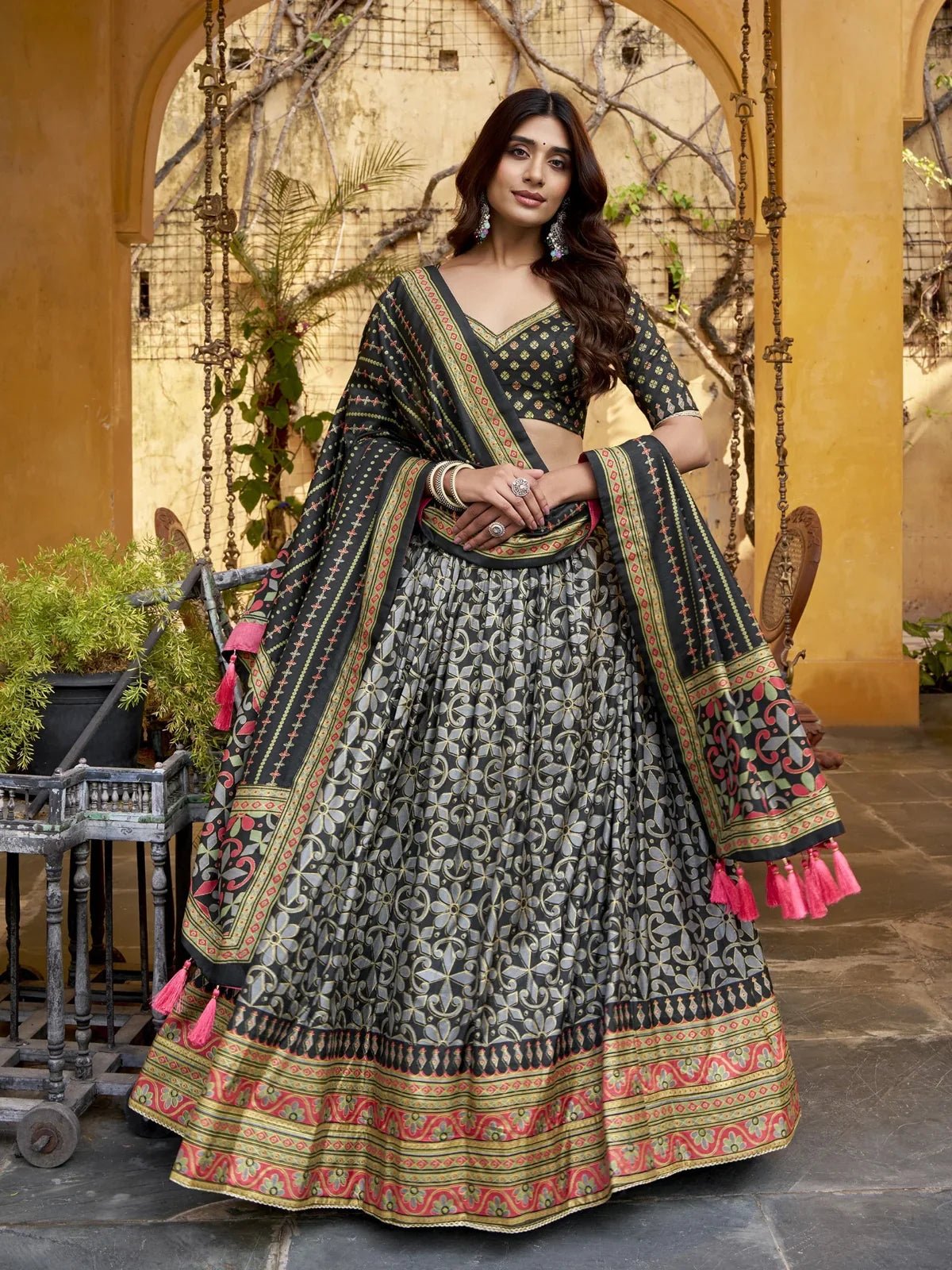 Tarani green silk lehenga with sparkle design and lace border in full front view