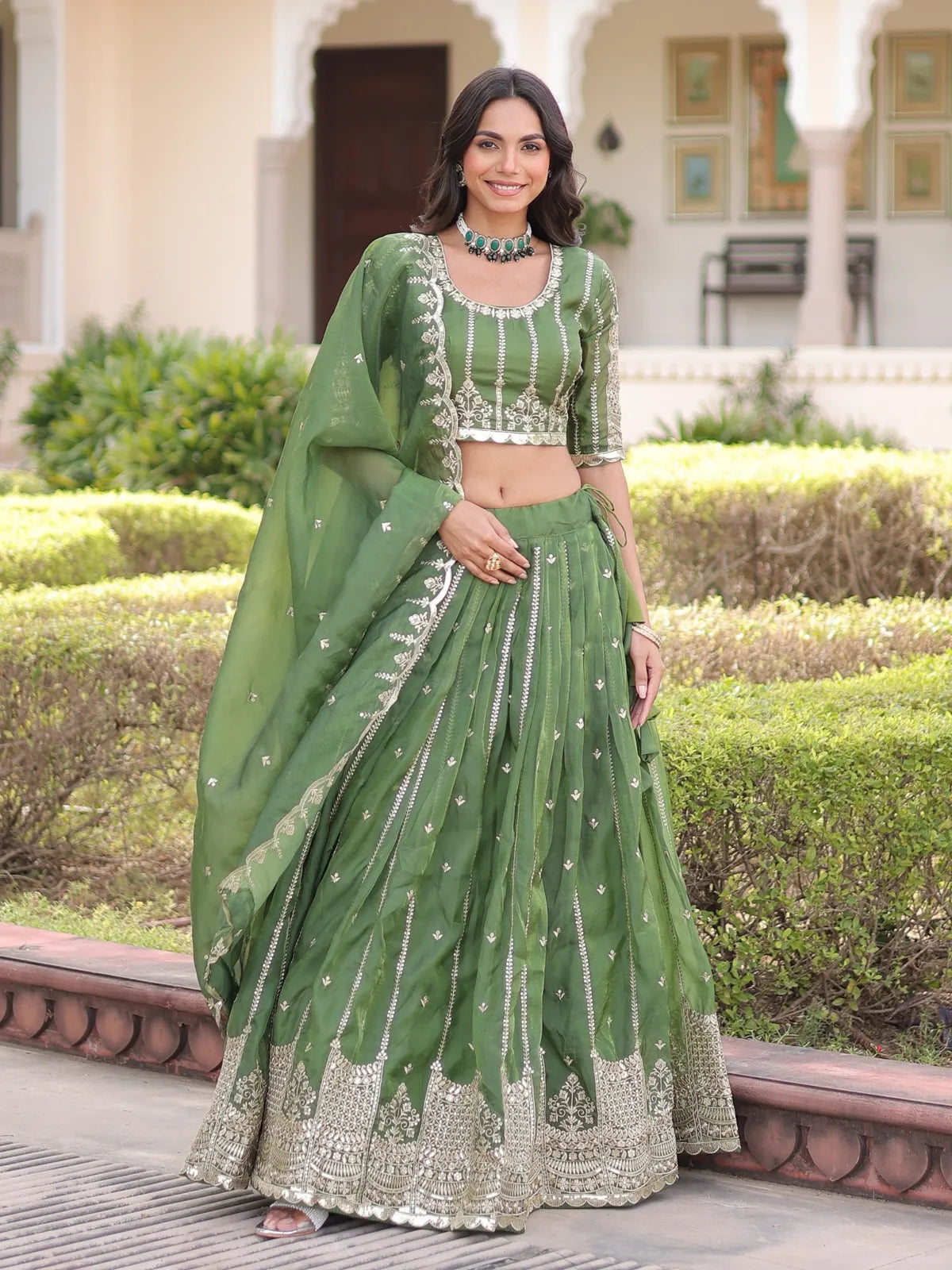 Tarani green silk lehenga with zari and sequin embroidery, full view with matching dupatta and blouse