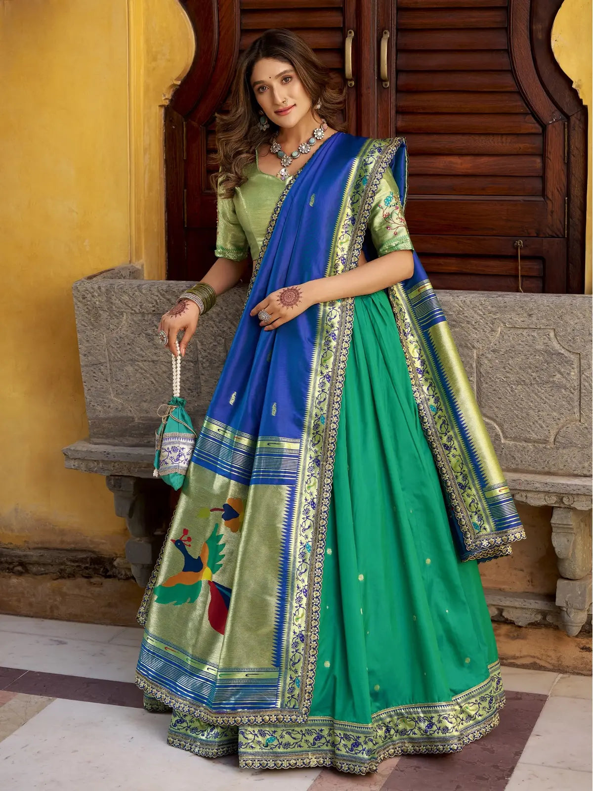 Tarani green silk lehenga with zari and embroidery, full front view with dupatta and batwa