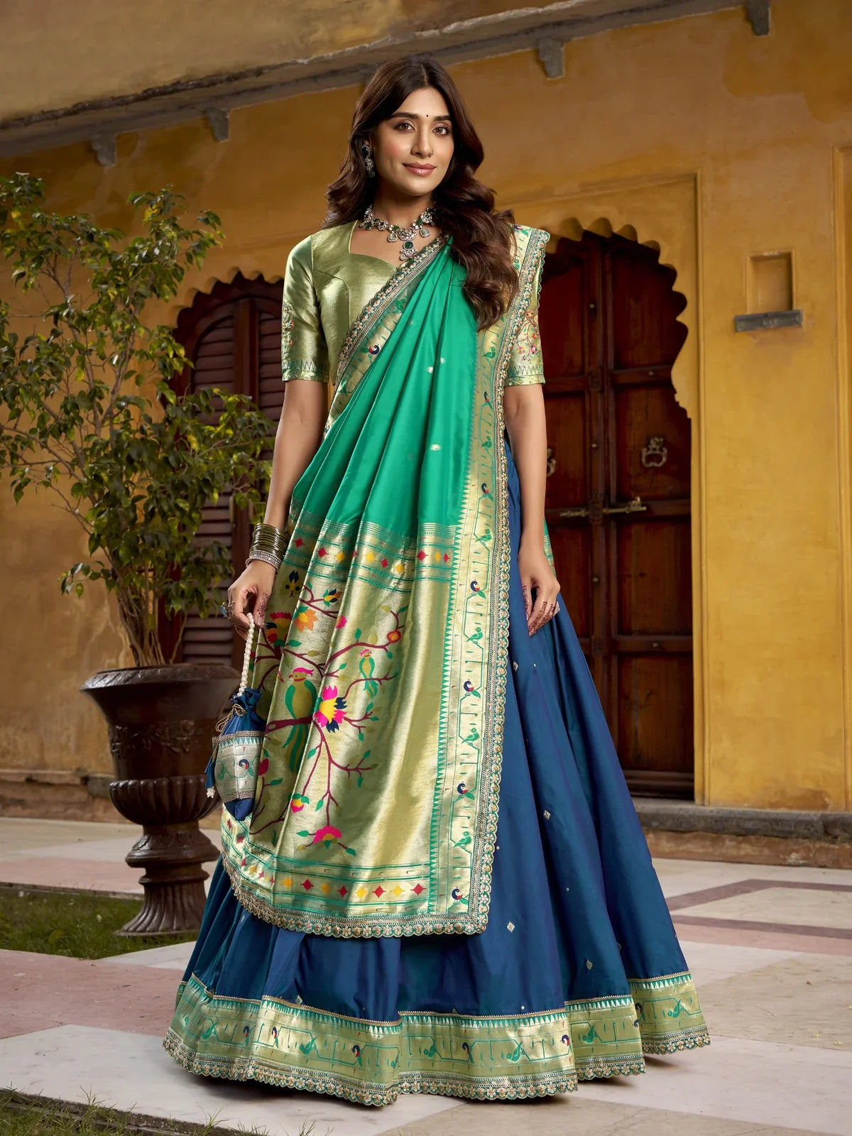 Tarani green soft silk lehenga with zari weaving and embroidered dupatta full view