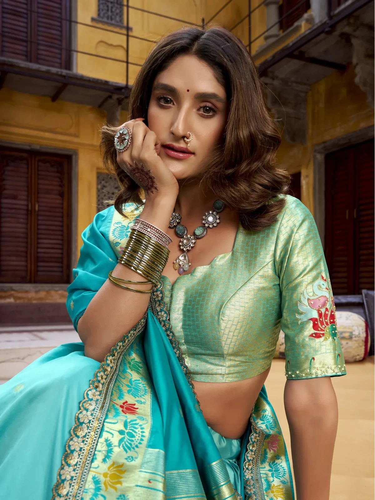 Tarani green blouse with zari work and scallop lace dupatta in upper body close-up