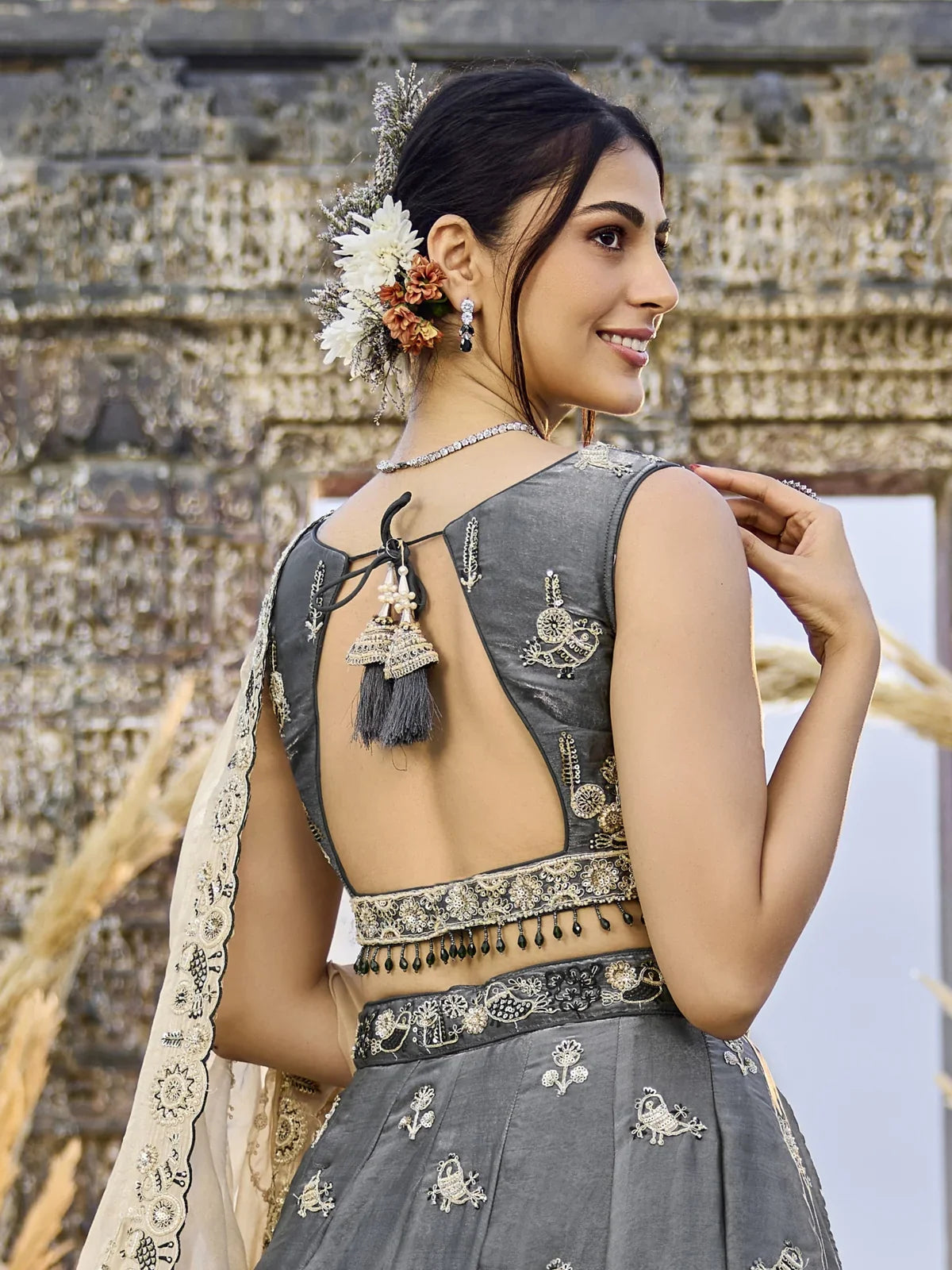 Tarani grey silk lehenga with embroidered blouse back design view