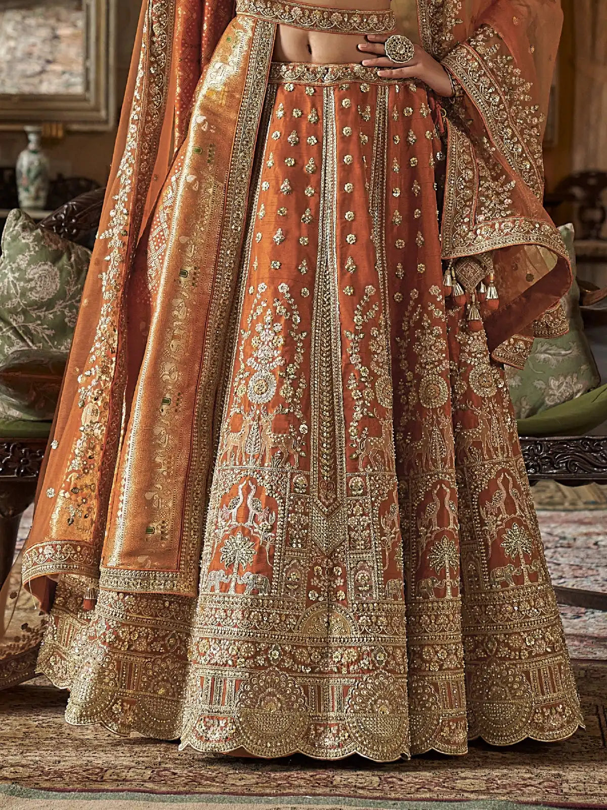Tarani bridal orange silk lehenga closeup view with sequins and thread pearl work