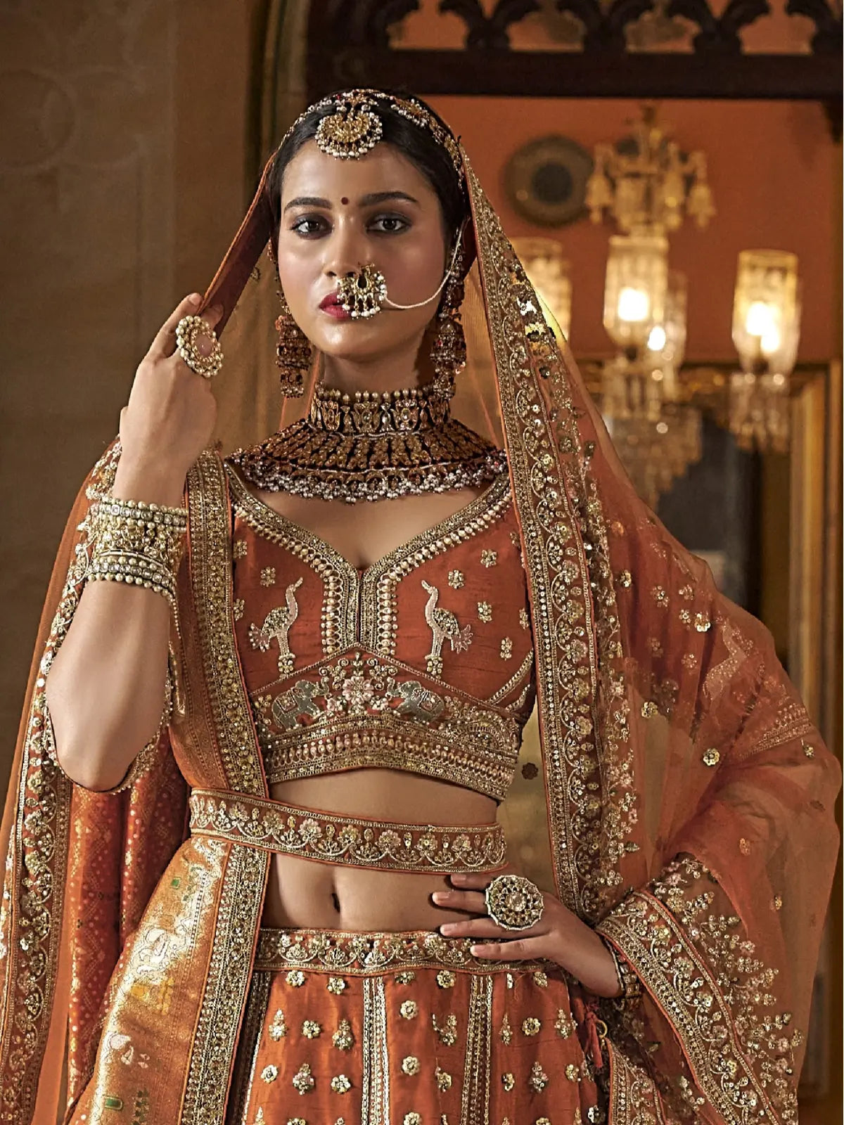 Tarani bridal orange silk lehenga front view with dupatta styling