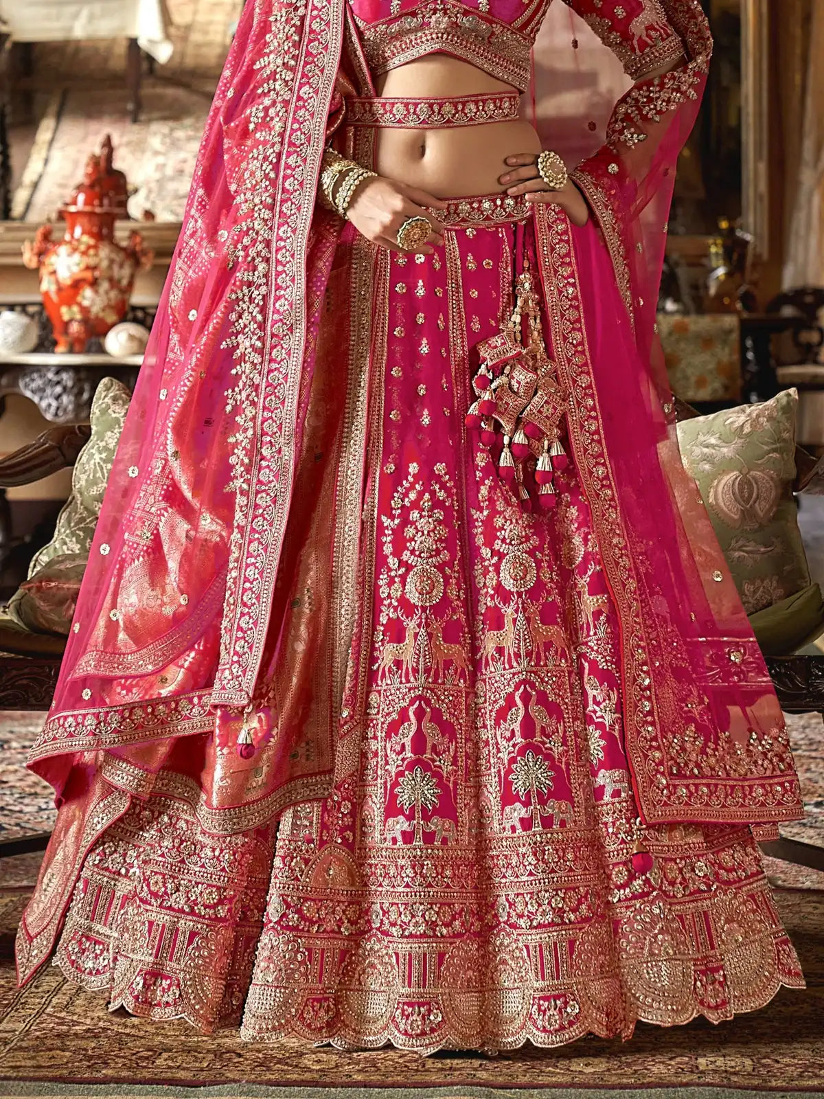 Tarani premium pink silk bridal lehenga closeup view showing sequins and pearl work