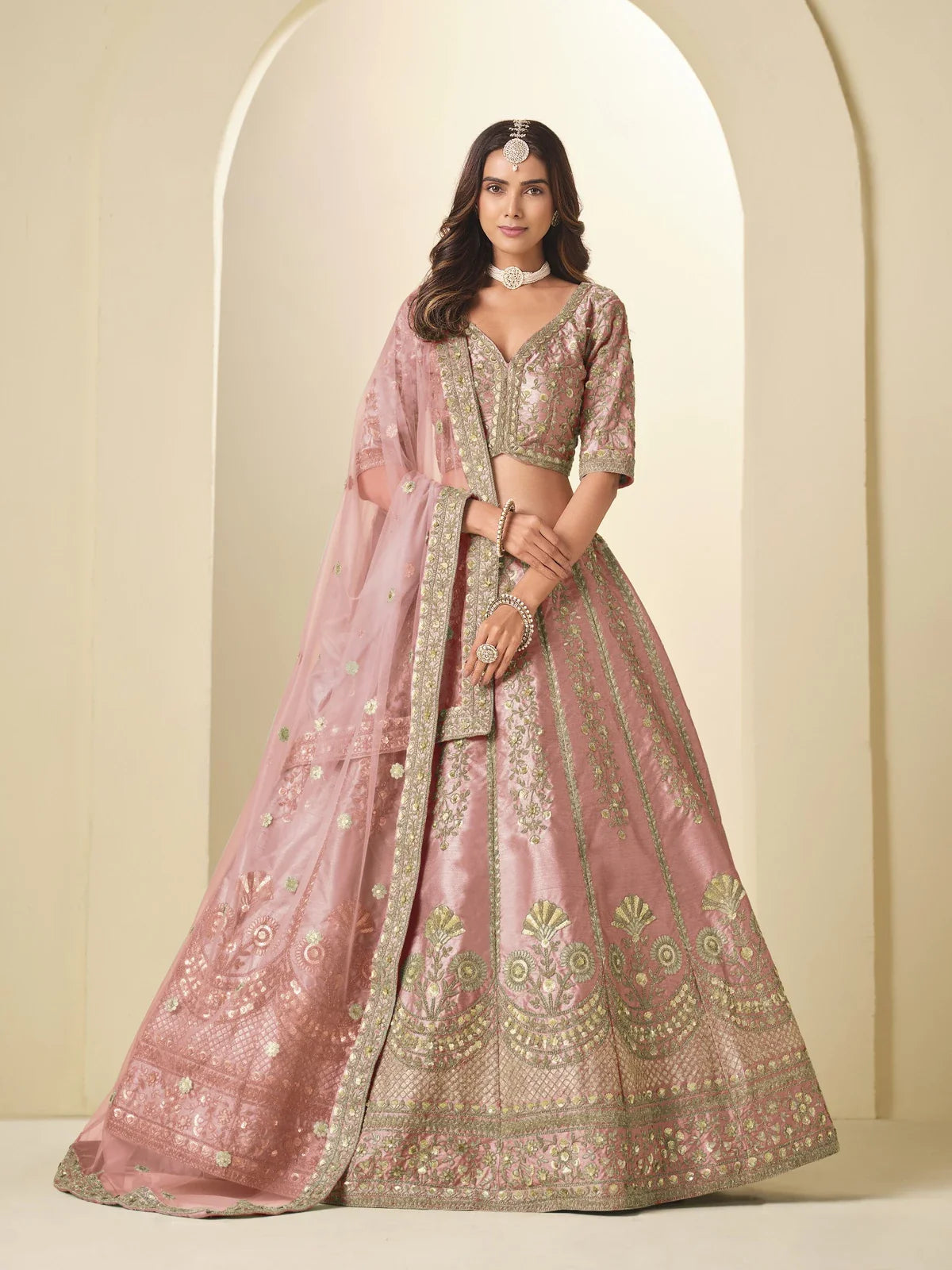 Tarani pink silk lehenga full view with embroidered blouse and net dupatta for wedding wear