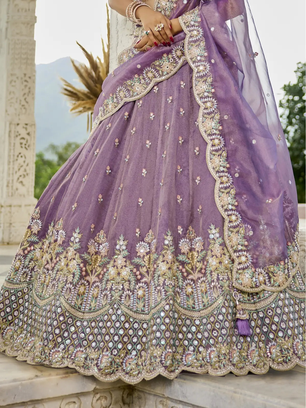Tarani purple satin silk lehenga closeup showing embroidery and border detailing