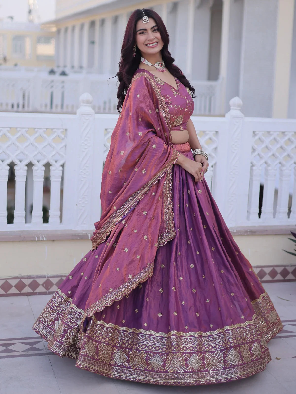 Tarani purple lehenga front view with flared silhouette and traditional dupatta