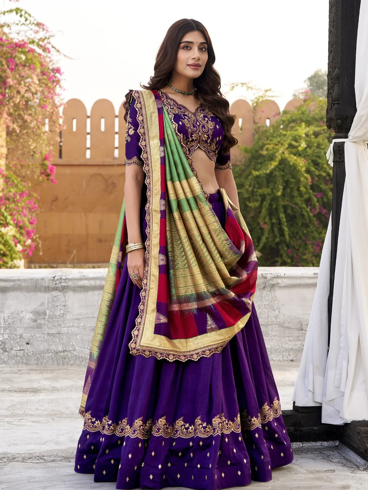 Tarani purple vichitra silk lehenga with golden embroidery and contrast dupatta for wedding wear