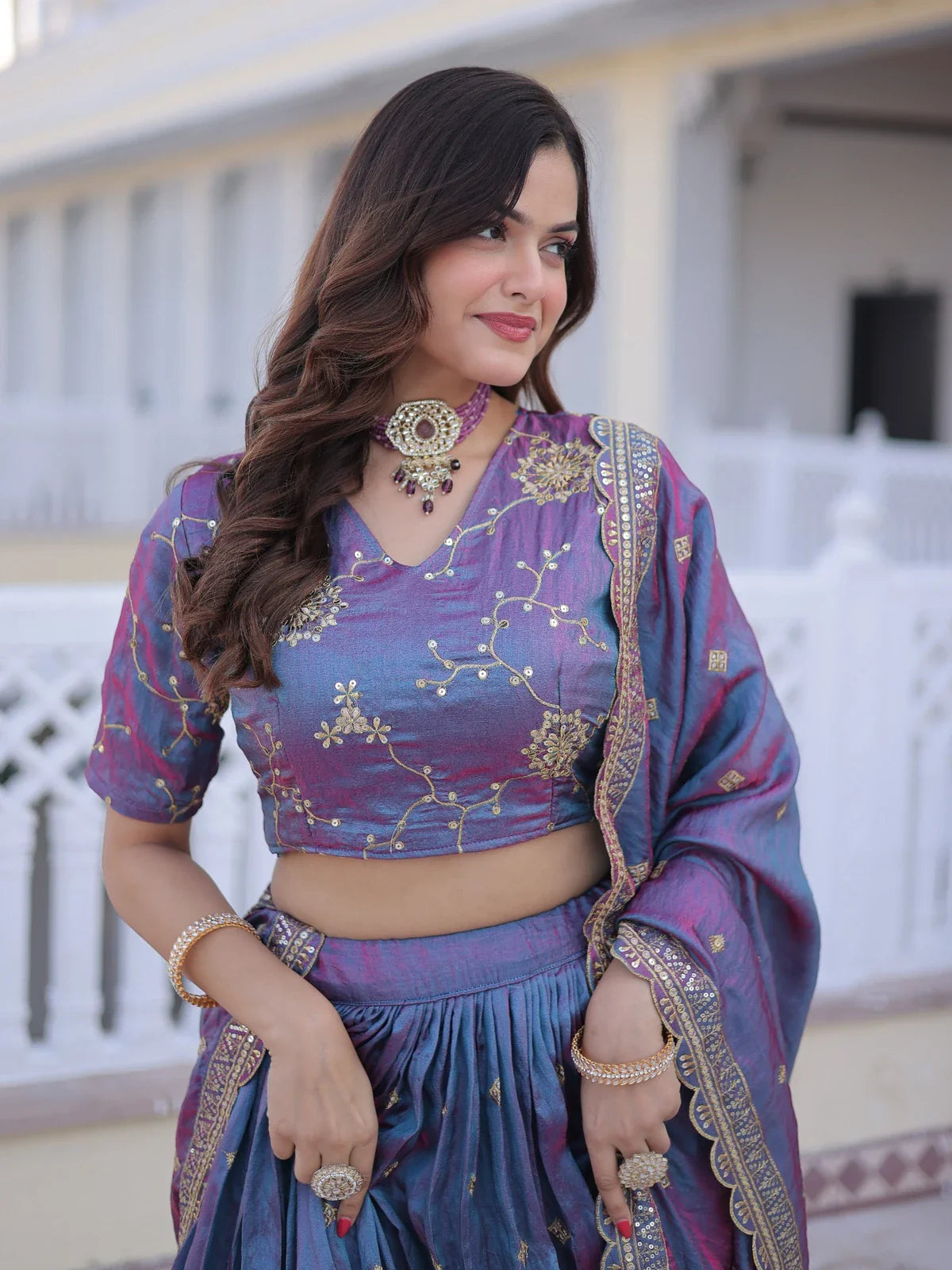 Tarani purple lehenga closeup of sequin embroidered blouse and neckline styling