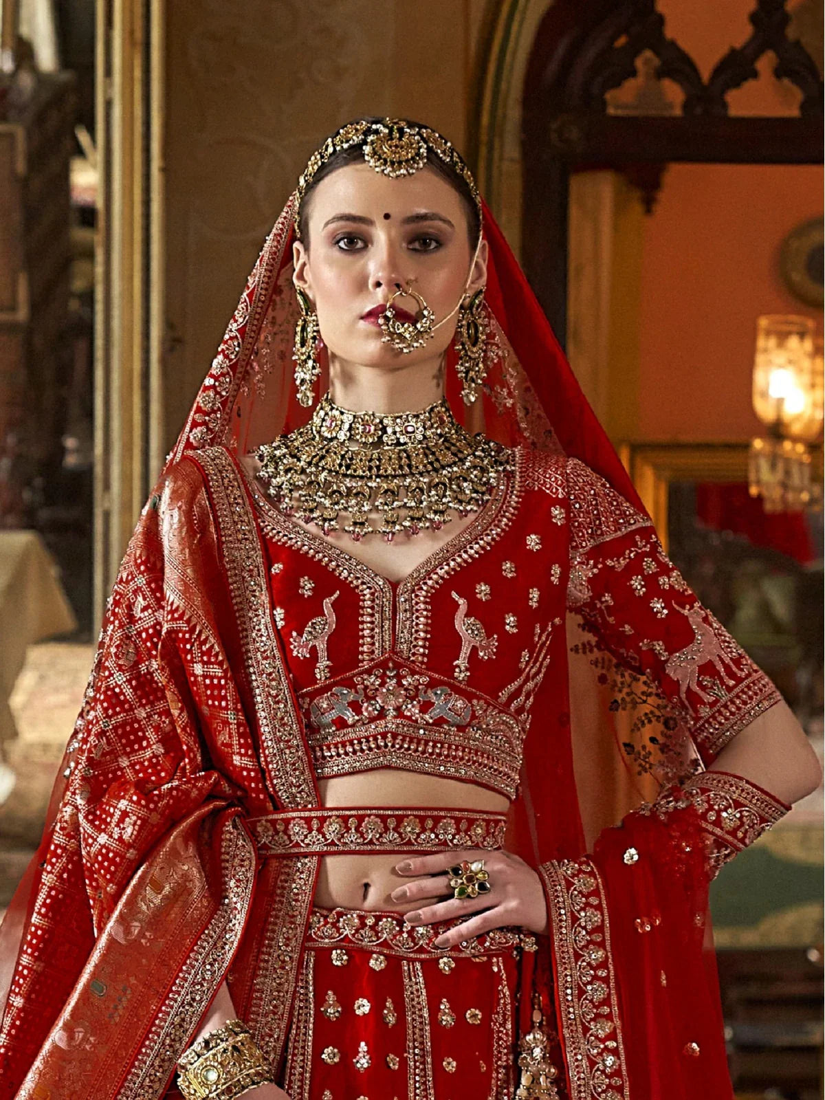 Tarani red silk bridal lehenga front view showcasing blouse and dupatta styling