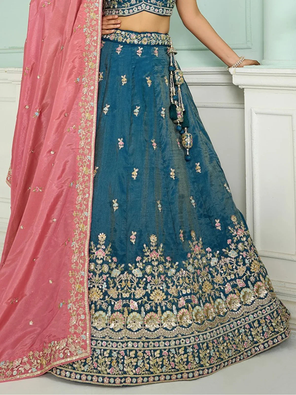 Tarani teal silk lehenga front skirt embroidery view