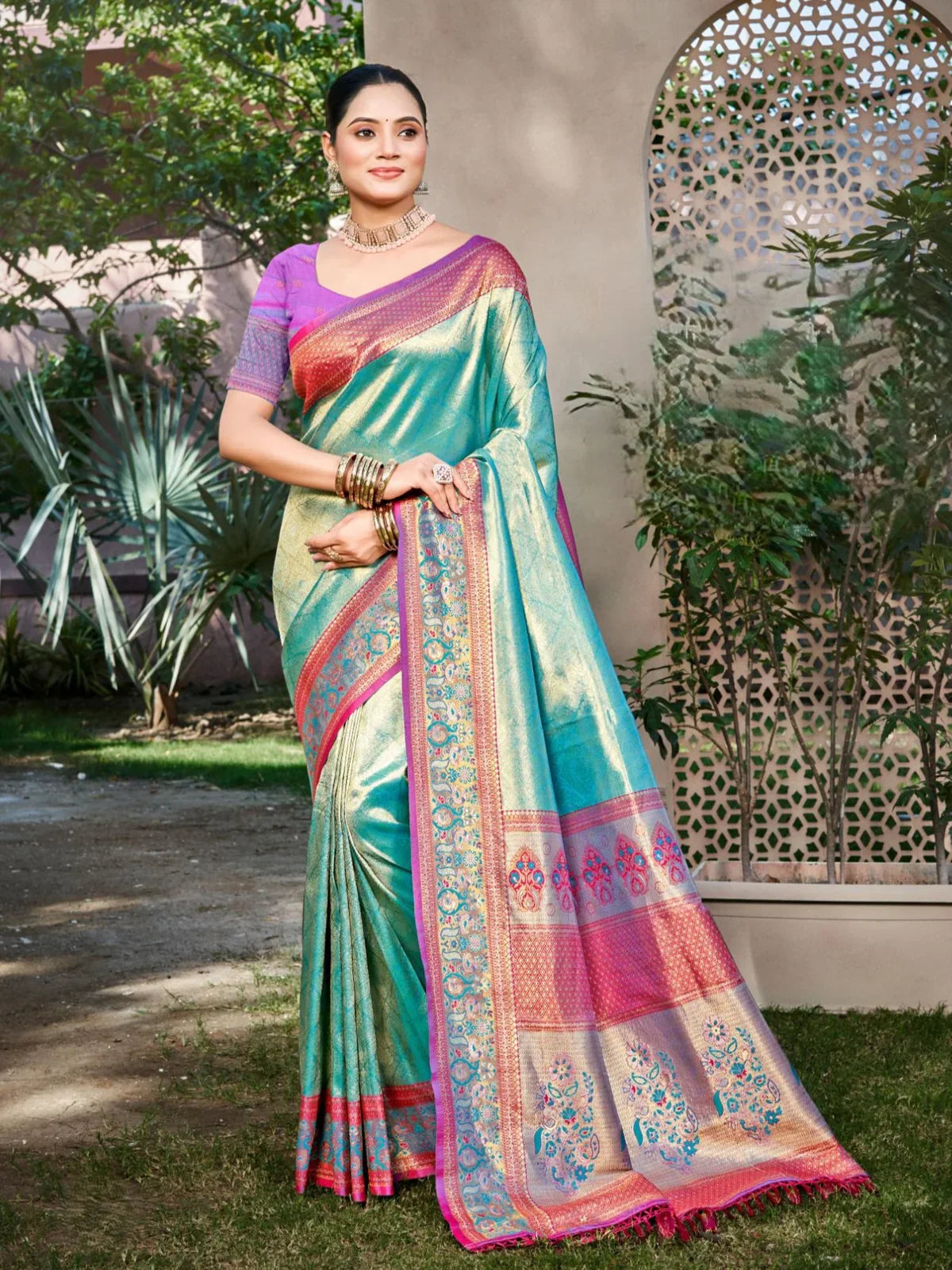 Tarani premium aqua green kanjivaram silk saree full view with intricate zari border