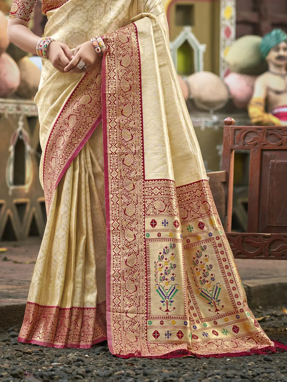 Tarani beige Kanjivaram silk saree pallu view highlighting intricate woven border and motifs