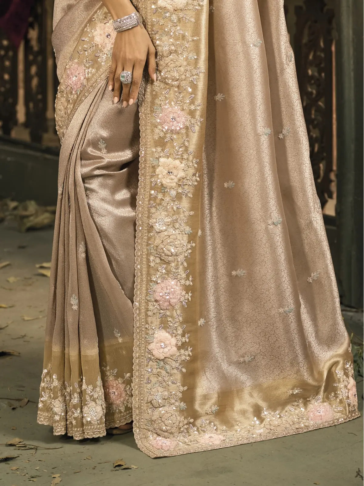 Tarani beige Zarif silk saree closeup view of floral embroidery with zari shine and pastel detailing