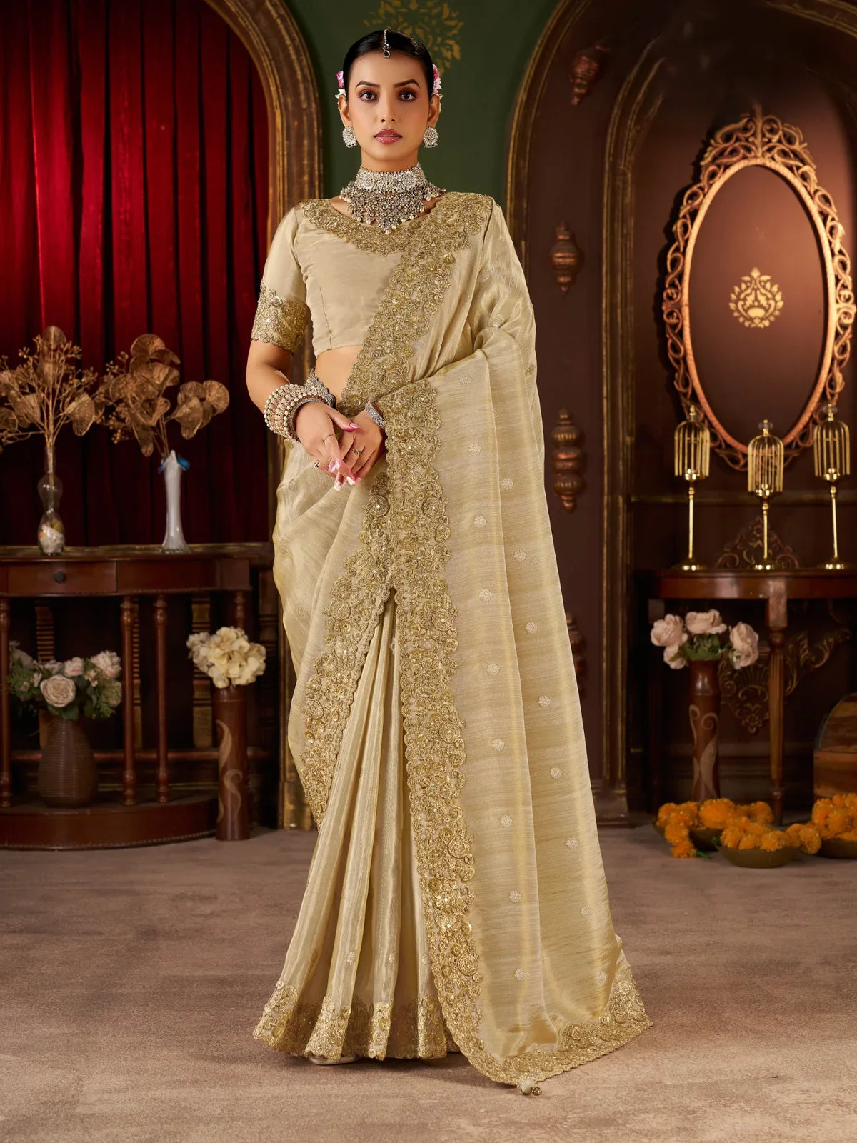 Tarani beige silk saree with heavy zari embroidery border in full front view