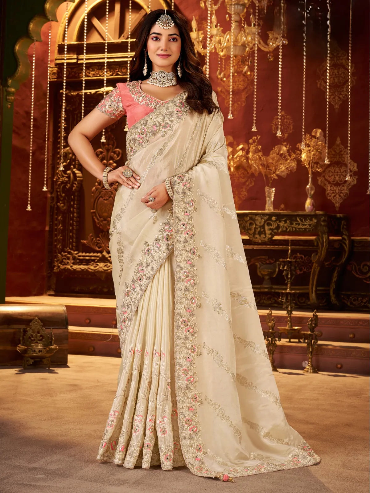 Tarani beige silk saree with heavy zari embroidery and pink blouse for wedding and festive occasions