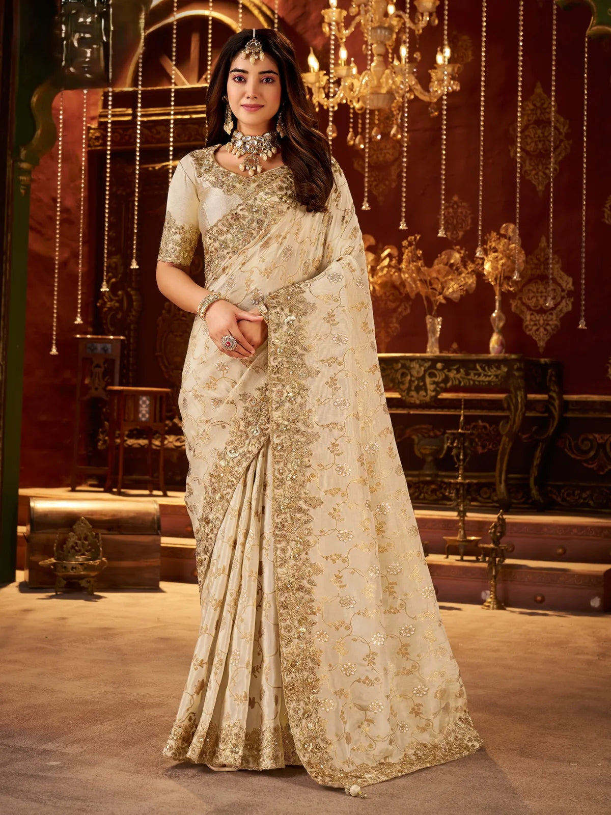 Tarani soft beige silk saree with golden zari embroidery and latkan pallu for festive weddings