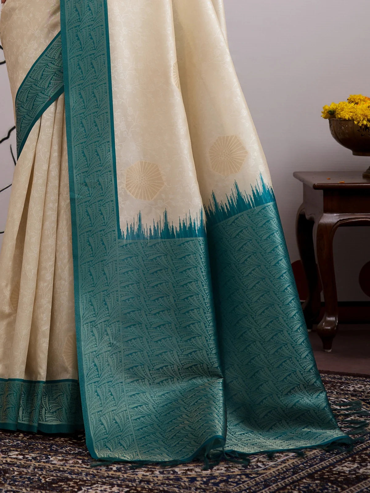 Tarani elegant pallu with teal blue zari design and detailed weaving in beige handloom silk saree