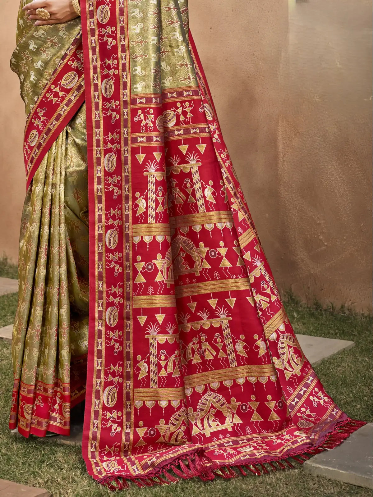 Tarani Kanjivaram silk saree beige body with detailed red pallu and zari motifs closeup view