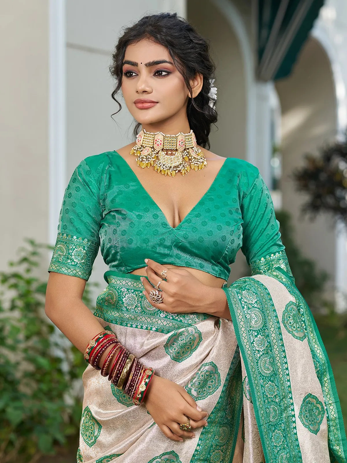 Tarani Pushpita Silk Blend Saree upper body view with woven blouse and zari border