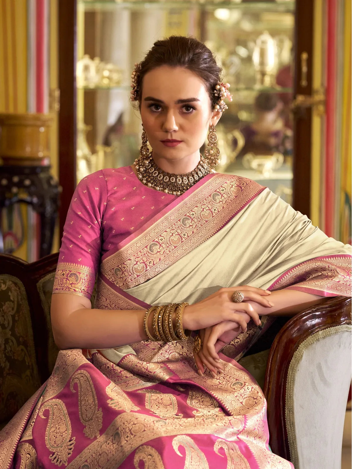 Tarani beige silk saree with pink border upper body pose showing blouse design